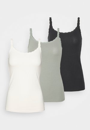 Drie naadloze hemdjes in wit, salie groen en zwart, met verstelbare spaghettibandjes en delicate scalloped randjes.