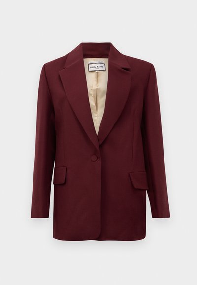 Burgundy blazer with a notch lapel, single button closure, and two front pockets. Features a contrasting beige lining. Smooth texture.