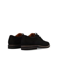 Schwarze Wildlederschuhe mit einem strukturierten Mesh-Einsatz, runder Zehenpartie und flachem Absatz. Verfügt über eine kontrastierende braune Außensohle und ein klassisches Schnürdesign.
