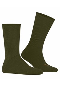 Grüne gerippte Socken aus strukturiertem Stoff mit verstärkter Ferse und Zehen. Auf der Sohle befindet sich ein dezentes Logo in kontrastierender Farbe.