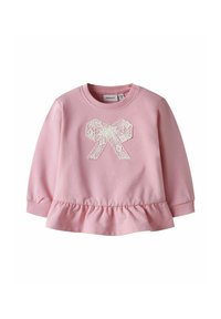 Felpa rosa chiaro con maniche lunghe, orlo arricciato e un design di fiocchi di pizzo bianco sul davanti. Materiale in cotone morbido con polsini a coste.