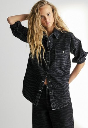 PRINTED - Paitapusero - black zebra