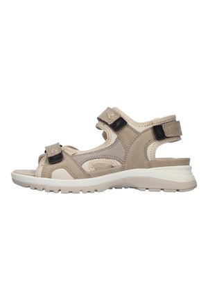 Beige og lysegrå sandal med åben tå, justerbare sorte velcroremme og en polstret hvid sål til udendørs brug.