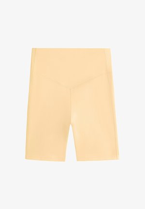 Shorts sportivi giallo chiaro con vita alta, trama liscia e linee pulite. Presentano un design senza cuciture e una lunghezza corta.