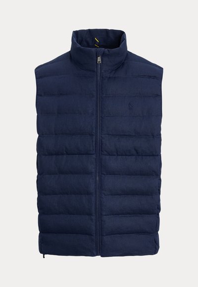 Granatowa, pikowana kamizelka bez rękawów z pełnym zamkiem z przodu i stojącym kołnierzem, z subtelnym haftowanym logo na piersi.