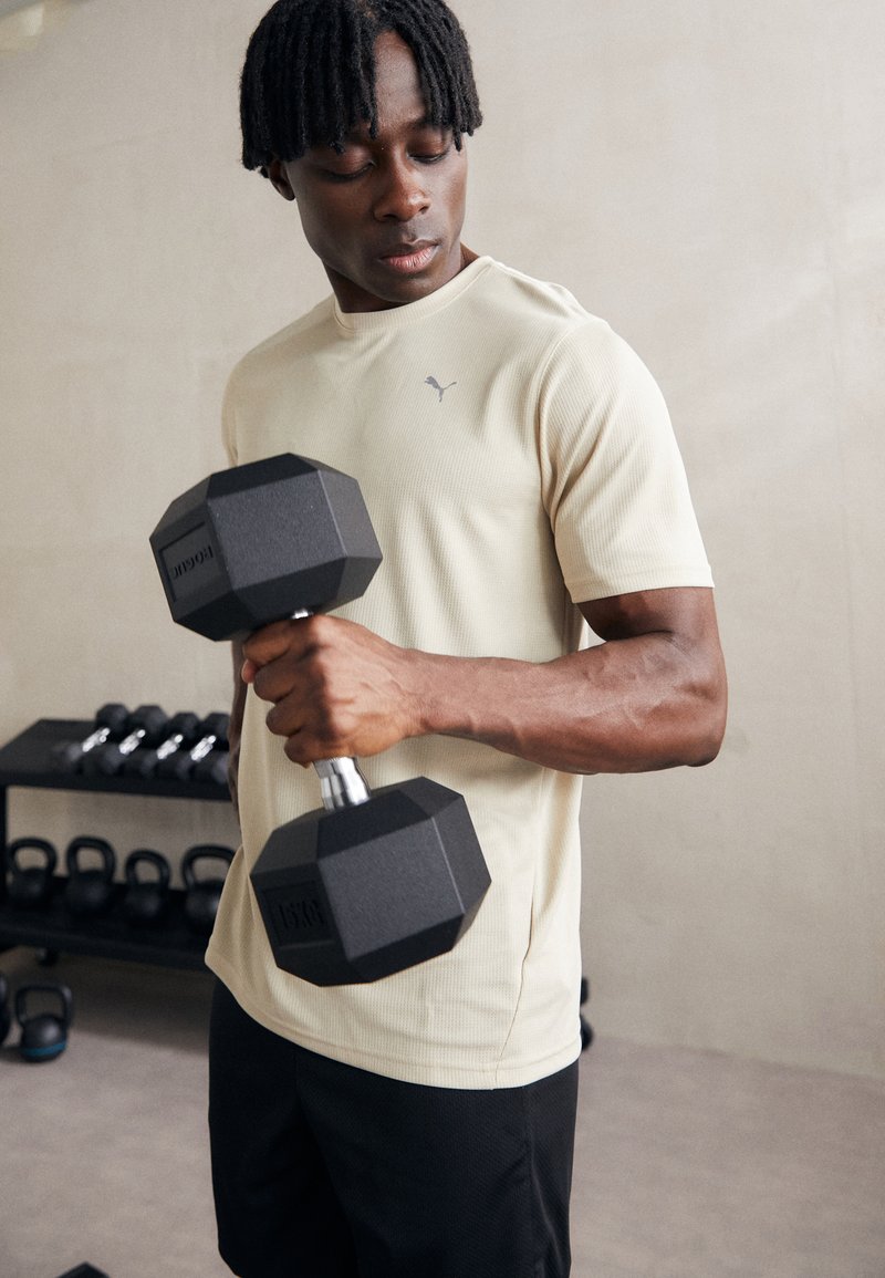 Puma PERFORMANCE TEE - Camiseta deportiva - putty