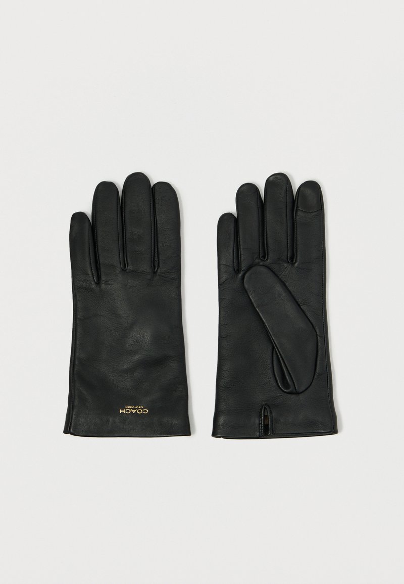 Luvas de couro preto com uma textura suave, cinco dedos e uma pequena abertura no pulso. Apresentam um logotipo dourado na base.