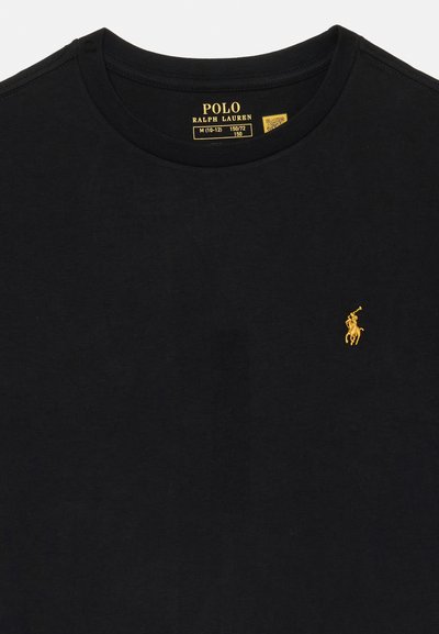 T-shirt noir Polo Ralph Lauren avec logo de joueur de polo brodé en jaune sur la poitrine gauche et étiquette de taille à l'intérieur du col.