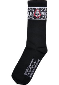 Schwarze Socke mit einem markierten Bündchen, das weiße Schriftzüge und rote Akzente aufweist, gefertigt aus einem glatten, dehnbaren Stoff. Zeigt ein Logo-Design.