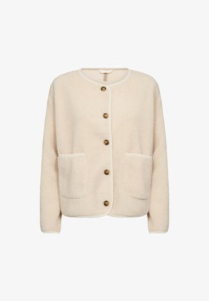 Crème kleurige fleece cardigan met lange mouwen, ronde halslijn, knoopsluiting, twee voorzakken en contrasterende afwerking langs de randen.