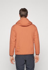 Icepeak YETTY - Lauko striukė - dark orange