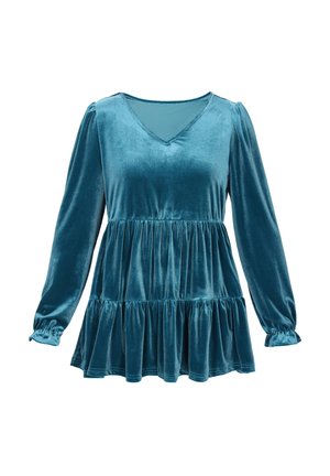 Teal bársony felső hosszú ujjal, V-nyakkal és rakott derékkal. A dizájn jellemzője a réteges alj és az elasztikus mandzsetta a további részletekért.