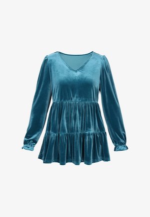 Teal bársony felső hosszú ujjal, V-nyakkal és rakott derékkal. A dizájn jellemzője a réteges alj és az elasztikus mandzsetta a további részletekért.