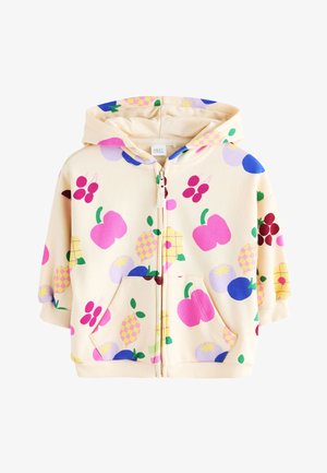 Sweat à capuche crème pour enfants avec fermeture éclair et motifs fruités colorés comprenant des pommes, des cerises, des ananas et des baies.