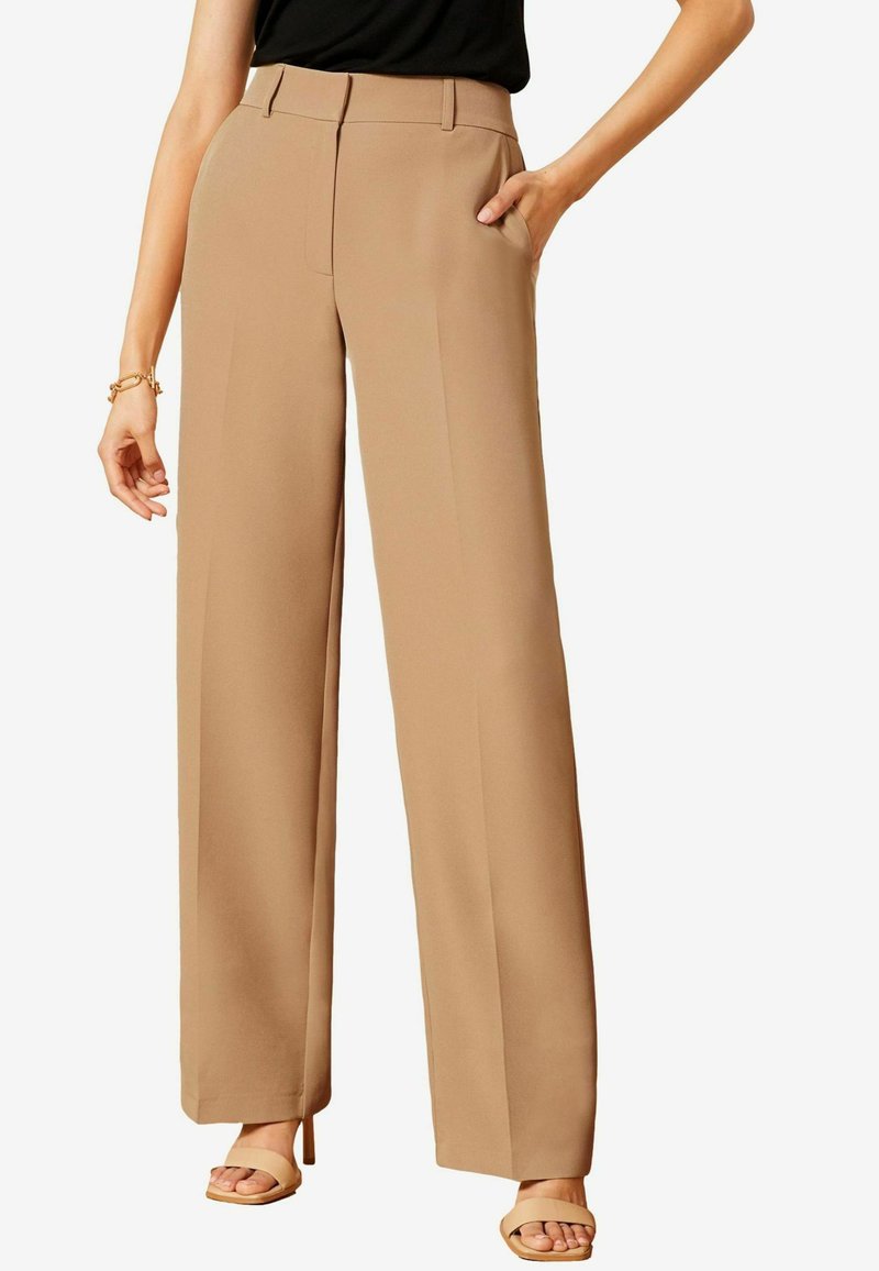 Pantaloni a gamba larga beige con vita alta, design plissettato e tasche laterali. Realizzati in un tessuto leggero e liscio.