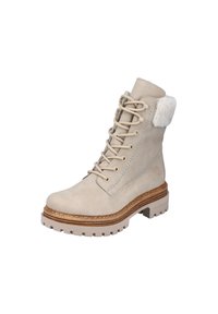 Bottines couleur beige clair en suede avec un col en fausse fourrure, bout rond et semelle en caoutchouc dotée d'un tread texturé pour l'adhérence.