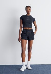 Nike Sportswear Treningo apatinė dalis - black