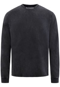 T-shirt nero a maniche lunghe realizzato in un tessuto morbido e leggermente texturizzato. Presenta un collo rotondo e un discreto marchio sul colletto.
