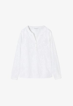 Bílá dlouhá rukávová blůza s volným střihem, zdobená květinovou výšivkou, s klopovým límcem a zapínáním na knoflíky vpředu. Jemná textilní struktura.