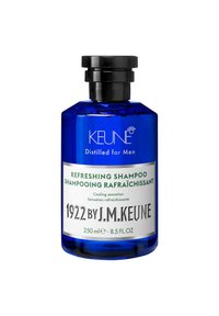 Bottiglia di vetro blu con tappo a vite nero. Presenta testi bianchi e verdi che leggono "Shampoo Rinfrescante" e "1922 di J.M. Keune." 250 ml.