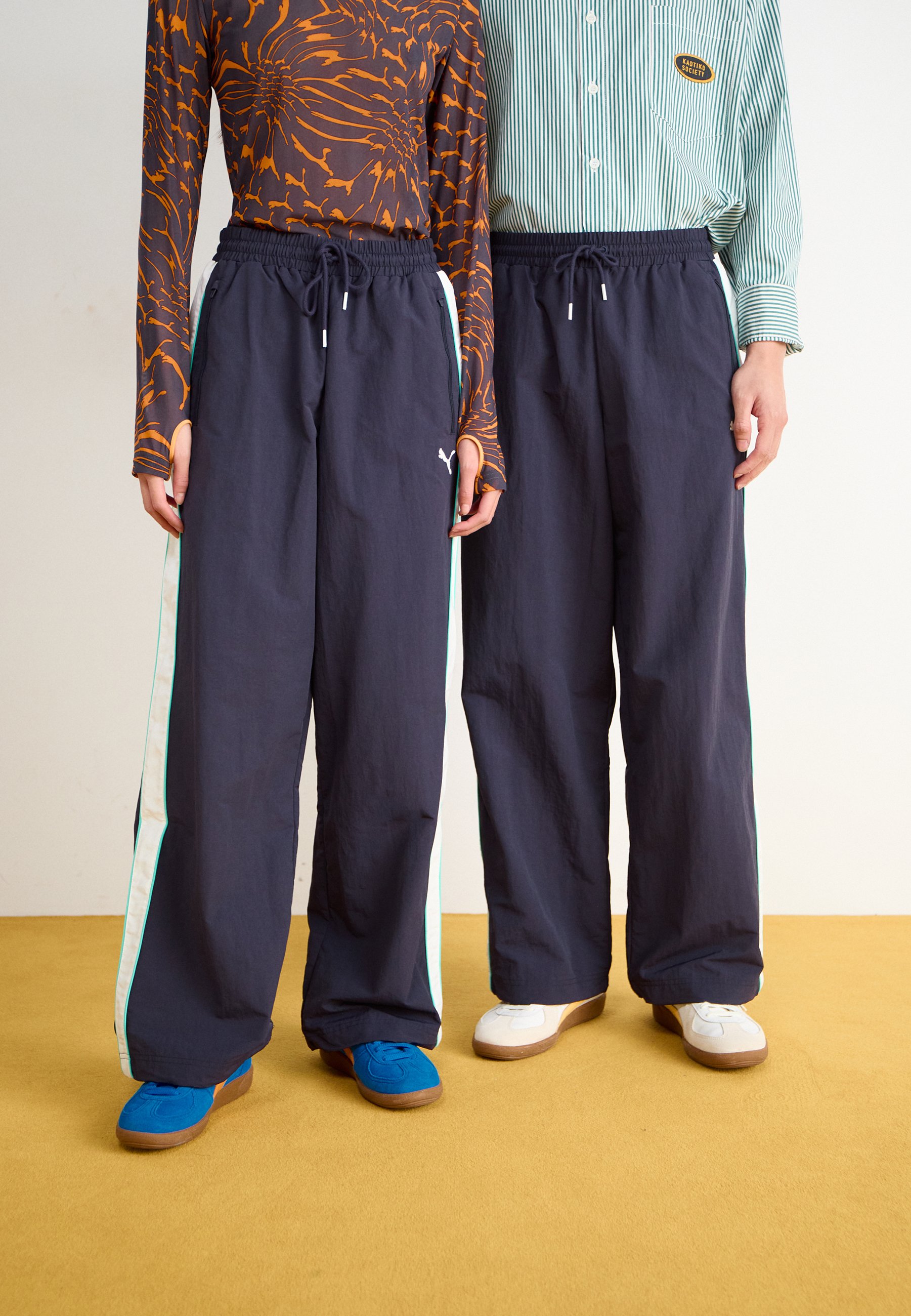 Puma OVERSIZED TRACK PANTS UNISEX - Tracksuit bottoms - new navy