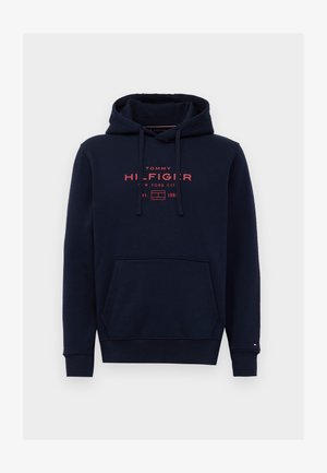 Marineblå hoodie med frontlomme og rød "Tommy Hilfiger New York City est. 1985" tekst og logo på brystet, snorhætte og ribbede manchetter.