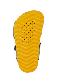 Sole della scarpa con un motivo a zigzag, realizzata in gomma gialla. Presenta fori di drenaggio, progettata per trazione e comfort.