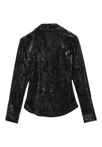 Blazer in velluto nero con colletto standard, maniche lunghe e chiusura con bottone singolo. Presenta una consistenza morbida e una leggerissima lucentezza.