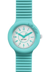 Montre en silicone turquoise avec un cadran rond, un fond blanc, des index turquoise et un bracelet cranté. Présente un marquage "HIP HOP" sur le boîtier.