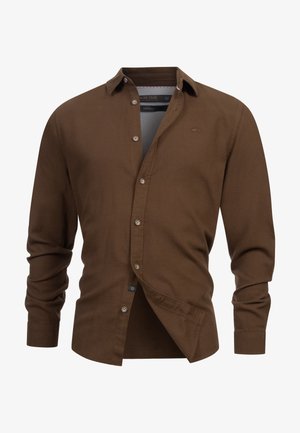 Braunes Langarm-Hemd mit Knöpfen aus weichem Material, das einen klassischen Kragen, sichtbare Knöpfe und ein kleines Logo auf der Brust aufweist.