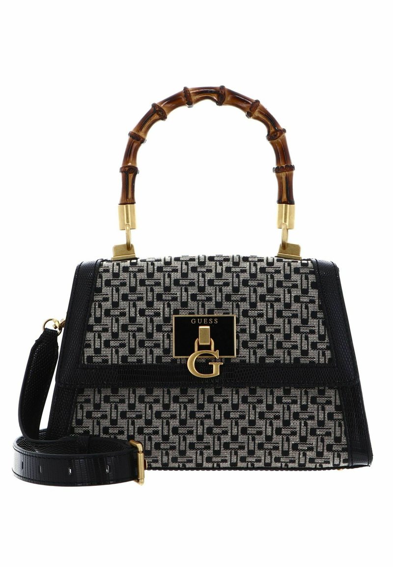 Borsa a tracolla in bianco e nero con manico in bambù, dettagli dorati, bordo in pelle textured e tracolla rimovibile.