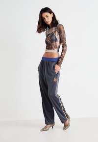 Jaded London FOOTBALL JOGGERS - Treniņtērpa apakšdaļas - blue