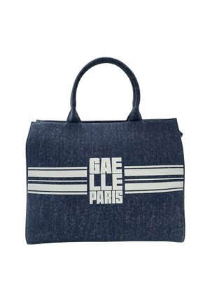 Borsa tote in denim blu scuro con due manici, caratterizzata da strisce orizzontali bianche e testo "GAELLE PARIS" in lettere bianche in grassetto.