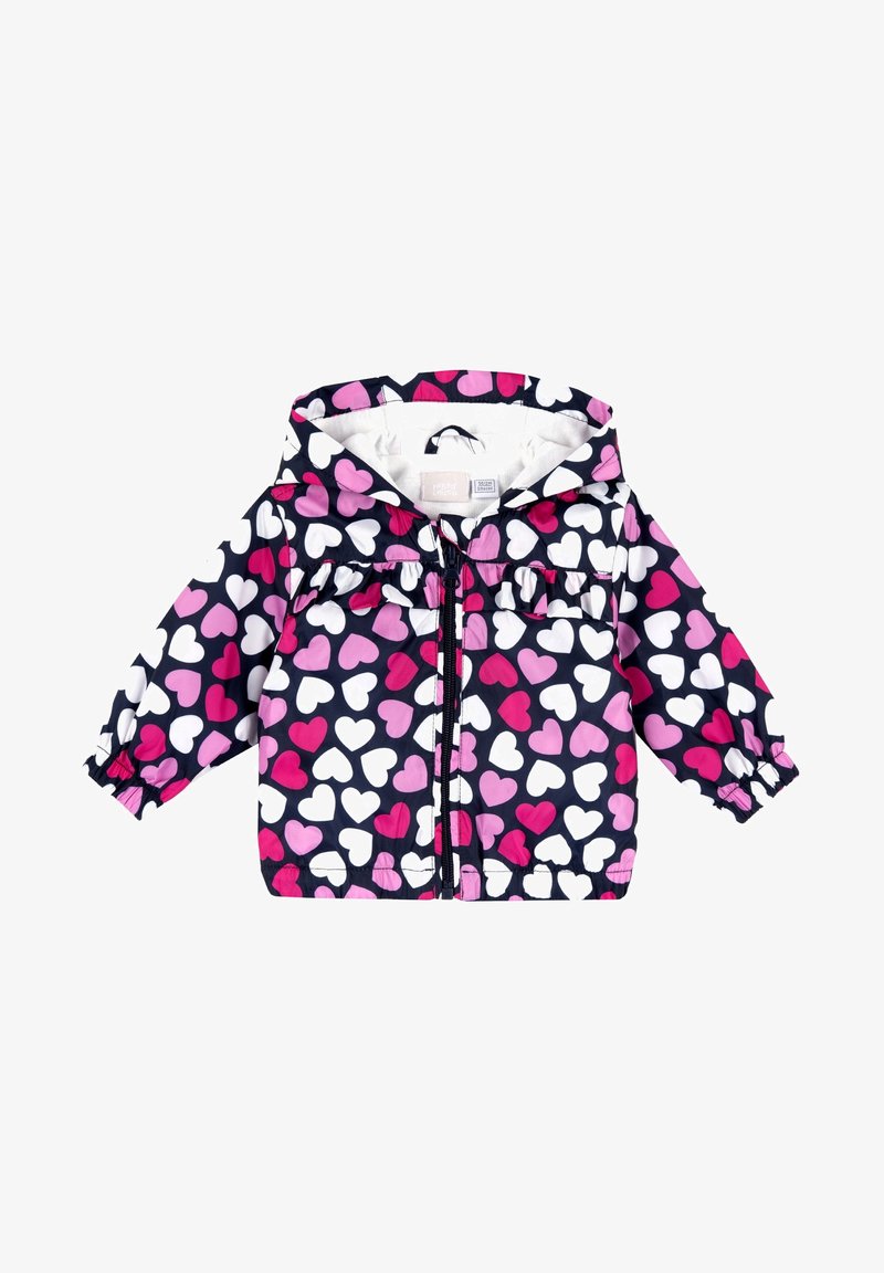 Veste légère bleu marine avec un motif de cœurs en rose et blanc, dotée d'un devant à volants, d'une fermeture éclair intégrale et de poignets élastiques.