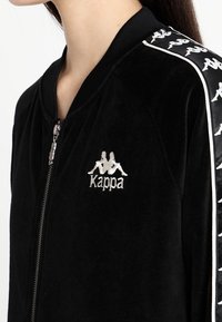 Kappa Felpa con zip - black