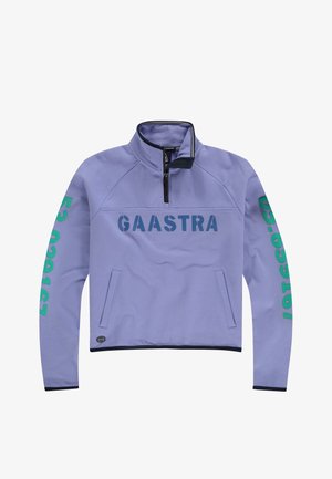 Pull-over en polaire violet clair avec demi-fermeture éclair, texte "GAASTRA" en bleu foncé, et chiffres verts sur la manche gauche. Comprend une poche latérale.