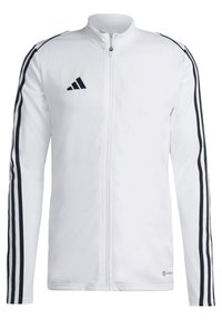 Witte ritsjack met zwarte strepen aan de zijkanten. Gemaakt van een gestructureerde stof. Bevat het Adidas-logo op de borst.