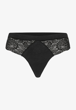 Schwarzer Tanga mit dreieckiger Form, ausgestattet mit einem Blumen-Spitzenbund und glattem Stoff, der einen Kontrast zwischen den Texturen hervorhebt.