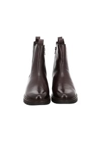 Pair of dark brown leather ankle boots with side zippers and pull tabs, featuring rounded toes and black rubber soles.
