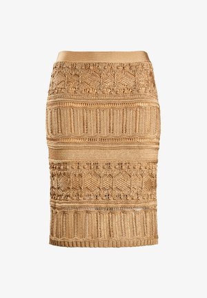 Jupe midi en tricot doré avec des motifs intriqués. Présente des sections texturées, une taille ajustée et des designs de points variés tout au long.