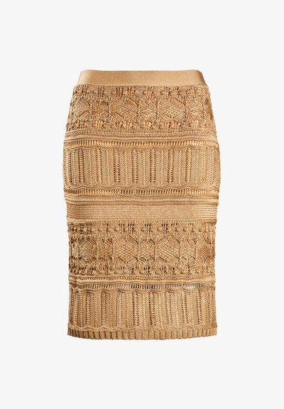 Pletena midi krila v zlatem z zapletenimi vzorci. Ima strukturirane dele, prilega se pasu in vsebuje različne šive po vsej površini.