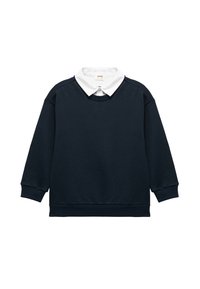 Sudadera azul marino con una camisa blanca de cuello debajo. Presenta puños y dobladillo acanalados. Elaborada en un tejido suave y texturizado con un corte relajado.