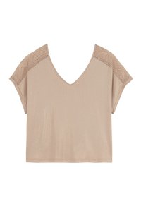 Haut beige à manches courtes avec un profond col en V et des accents texturés sur les épaules. Matière douce avec un léger brillant.
