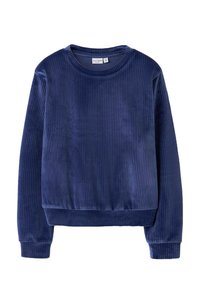 Felpa a coste di colore blu navy, realizzata in morbido tessuto, con scollatura rotonda e maniche lunghe, orlo corto e vestibilità rilassata.