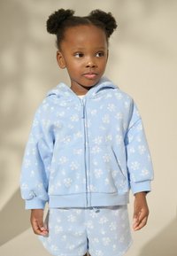 Next Teplákové kalhoty - blue ditsy floral