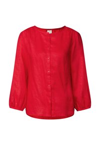 Blusa di lino rossa con maniche lunghe e svasate, scollo rotondo e chiusura frontale con bottoni; vestibilità leggermente ampia con una texture liscia.