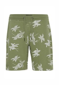 Green shorts made of cotton blend with white palm leaf pattern, adjustable waistband with drawstring, and side pockets.