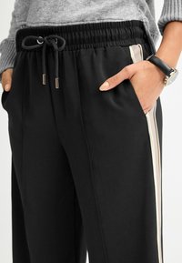 Next WIDE LEG - Kelnės - black  grey