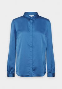 Blå satin skjorta med krage, knappstängning fram och långa ärmar med elastiska ärmslut. Slät textur och skräddarsydd passform.