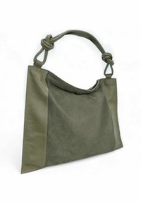Sac à épaule vert olive combinant des côtés en cuir lisse et un centre en daim, avec des poignées en cuir nouées.